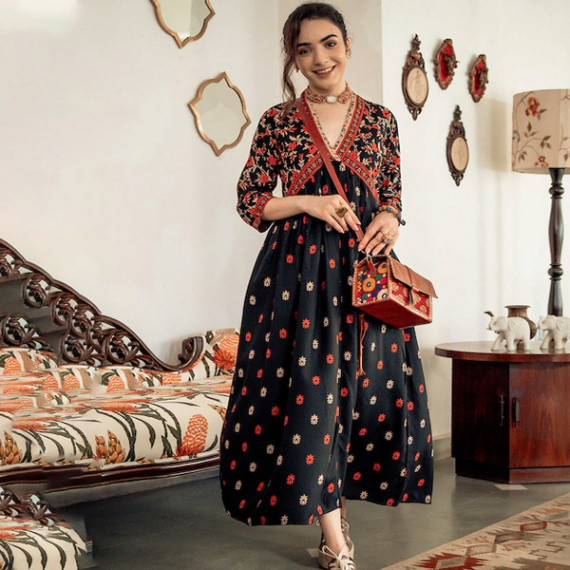 https://www.easyeleganz.com/products/black-orange-ethnic-motifs-printed-maxi-dress