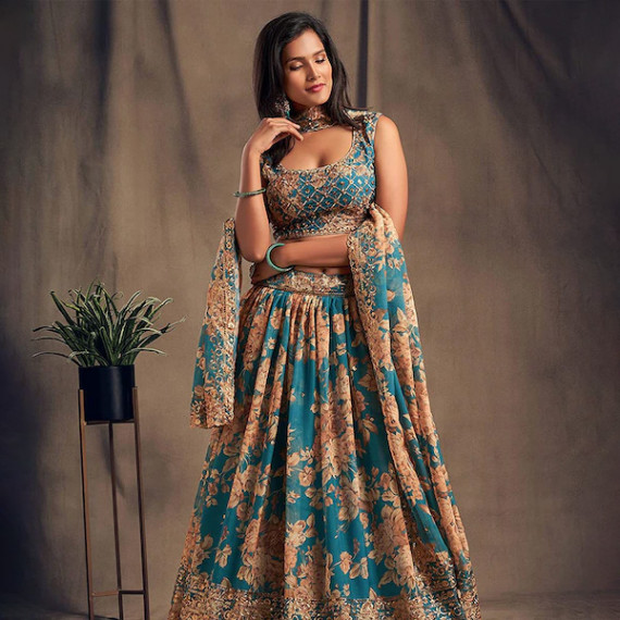 https://www.easyeleganz.com/products/blue-beige-printed-semi-stitched-lehenga-unstitched-blouse-with-dupatta